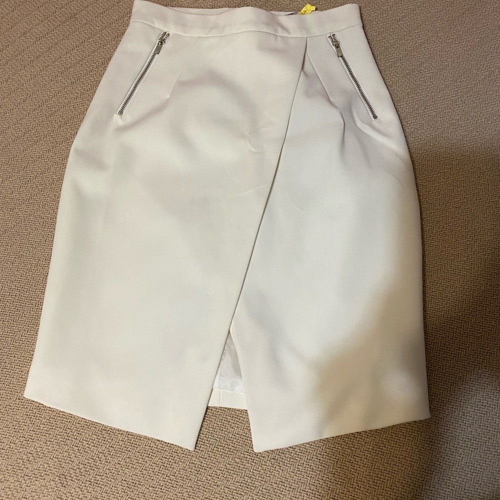 Elegant skirt dry cleaners ticket still on